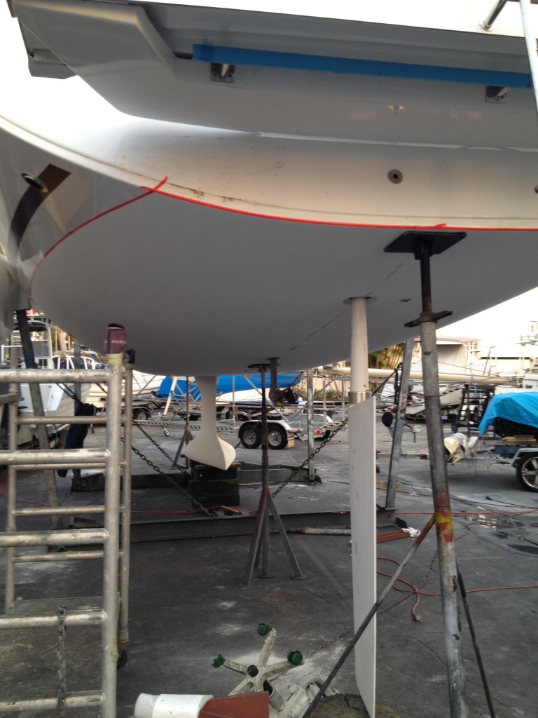 Sandy Feet with Keel on and Rudder being fitted.